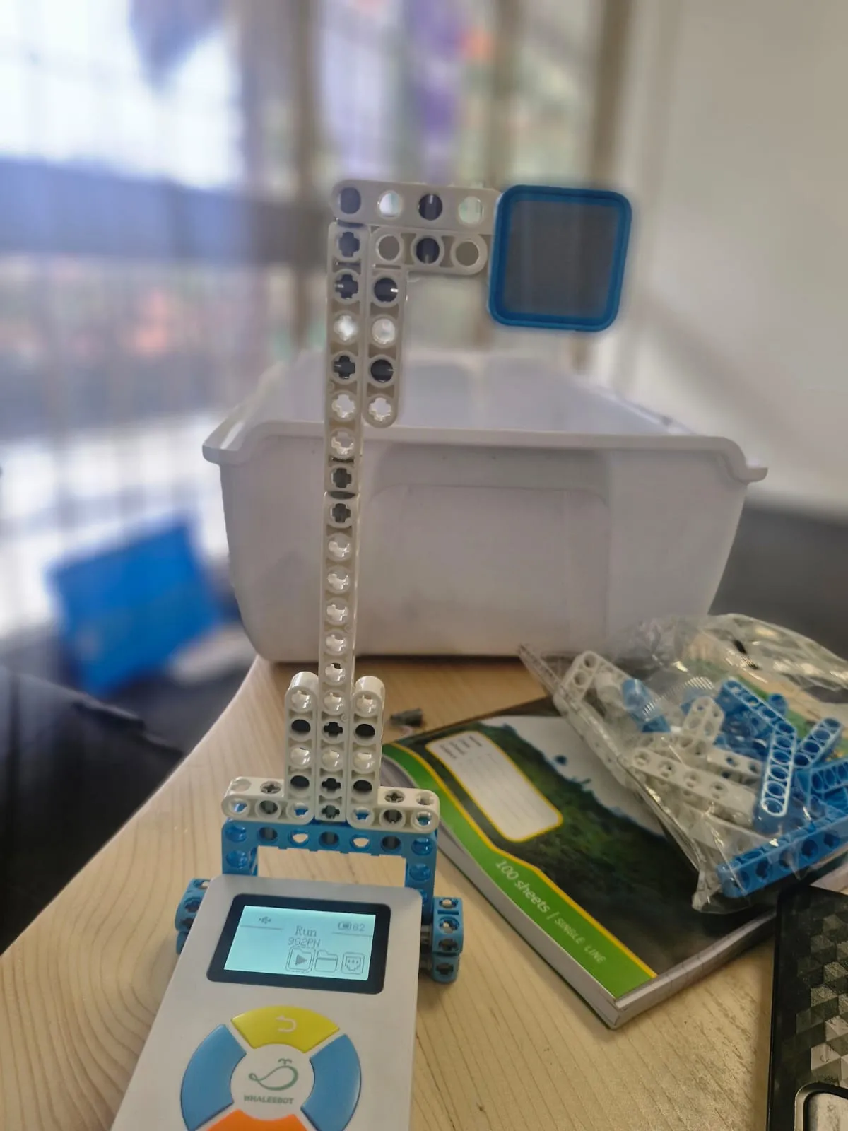 A camper-built WhalesBot construction with remote control on the robotics table