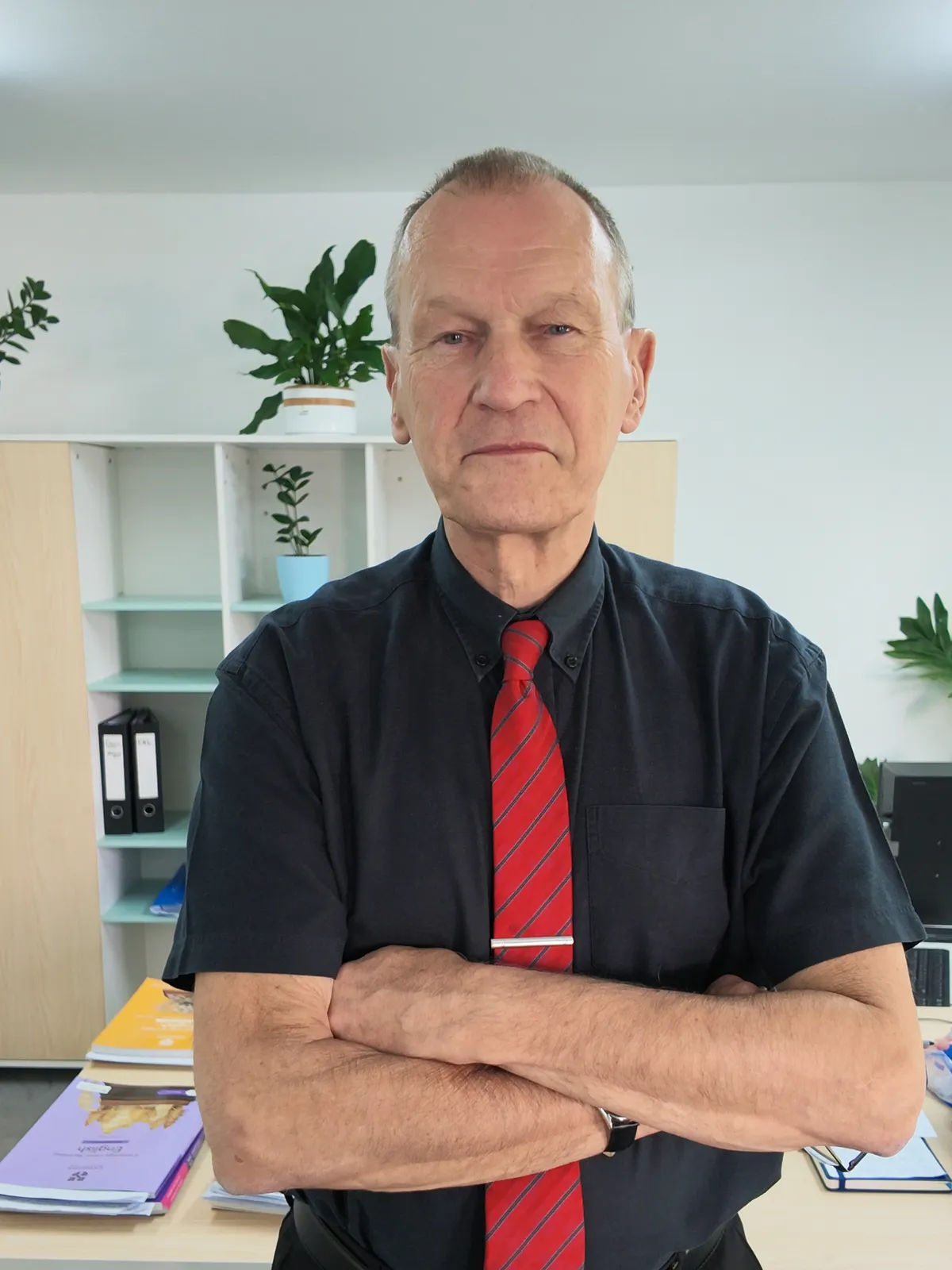 Daniel Hiest, School Director at Nucleus International Schools, standing in his office in Addis Ababa